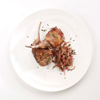 Bacon-Wrapped Lamb Rib Chops Over Caramelized Caraway Onions: Main Image