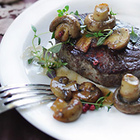 Juniper and Cedar Roasted Lamb with Button Mushrooms and Watercress: Main Image