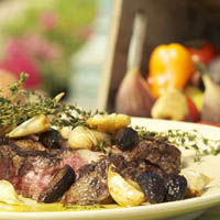 Rib Eye Steak with Black Pepper Mission Figs, Roasted Garlic, and Thyme: Main Image