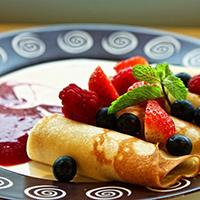 French Crepes with Cream Filling and Strawberry Topping: Main Image