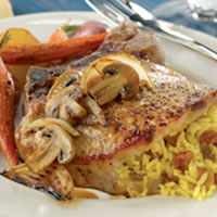 Curried Raisin Rice Stuffed Pork Rib Chops with Caramelized Onions and Mushrooms: Main Image